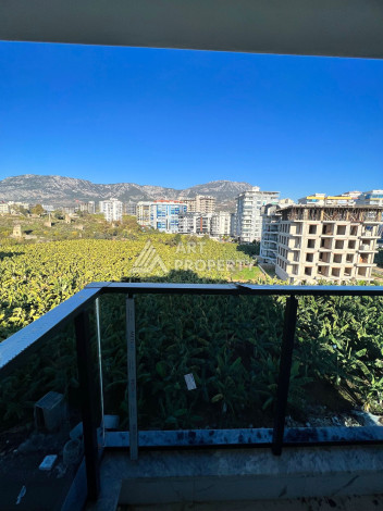 Две квартиры 1+1 от инвестора по цене дешевле, чем у застройщика, район Махмутлар! - Ракурс 7