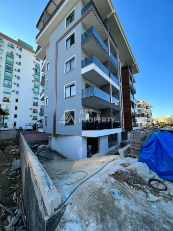 Две квартиры 1+1 от инвестора по цене дешевле, чем у застройщика, район Махмутлар! - Ракурс 9