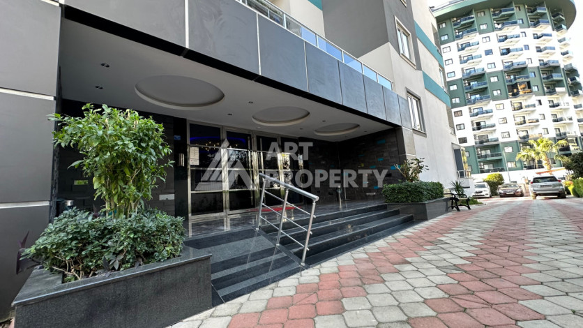 Квартира в Махмутларе 1+1 с мебелью - Ракурс 5