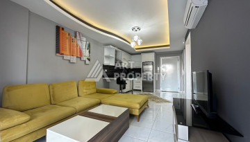 Квартира в Махмутларе 1+1 с мебелью - Ракурс 7