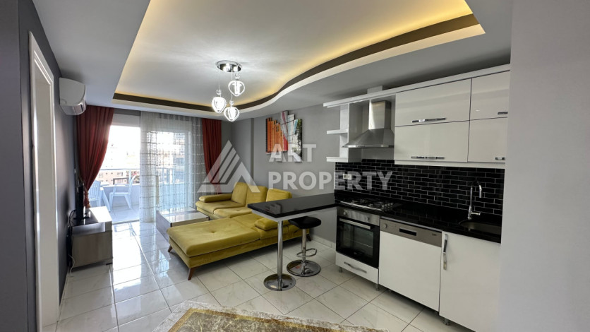 Квартира в Махмутларе 1+1 с мебелью - Ракурс 7