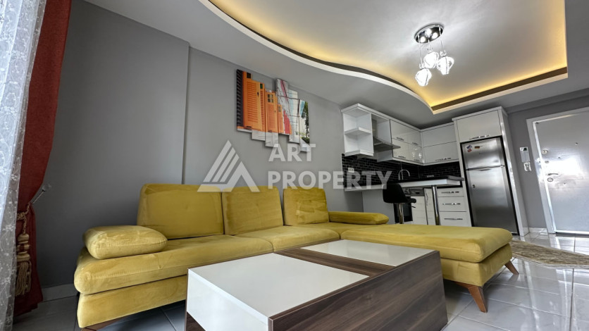 Квартира в Махмутларе 1+1 с мебелью - Ракурс 11