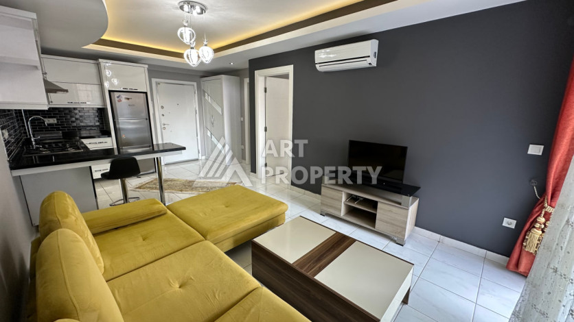 Квартира в Махмутларе 1+1 с мебелью - Ракурс 12