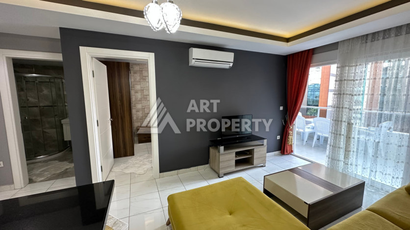 Квартира в Махмутларе 1+1 с мебелью - Ракурс 15