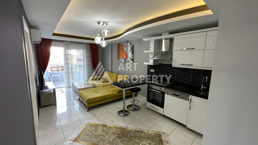 Квартира в Махмутларе 1+1 с мебелью - Ракурс 16