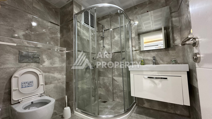 Квартира в Махмутларе 1+1 с мебелью - Ракурс 17