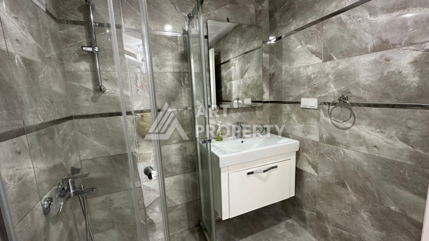 Квартира в Махмутларе 1+1 с мебелью - Ракурс 18