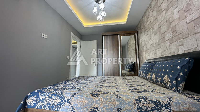 Квартира в Махмутларе 1+1 с мебелью - Ракурс 21