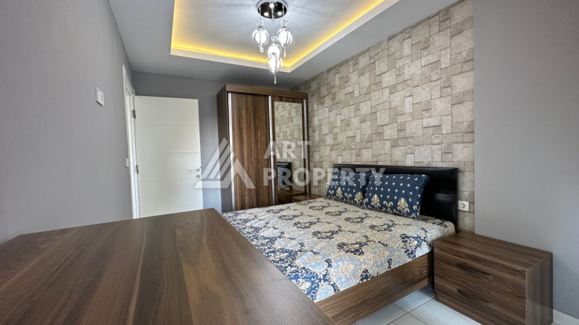 Квартира в Махмутларе 1+1 с мебелью - Ракурс 22