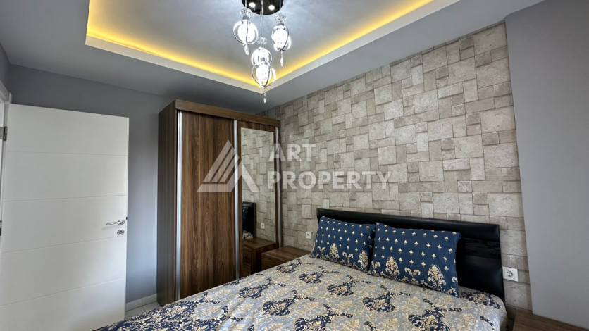 Квартира в Махмутларе 1+1 с мебелью - Ракурс 24