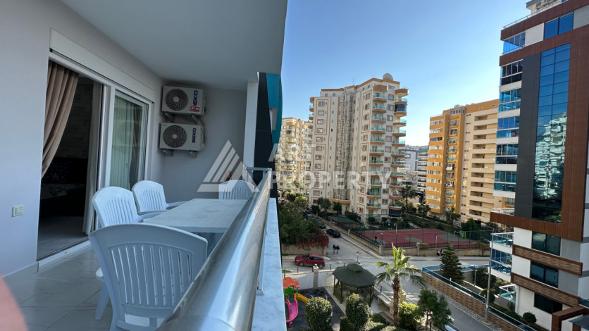 Квартира в Махмутларе 1+1 с мебелью - Ракурс 26