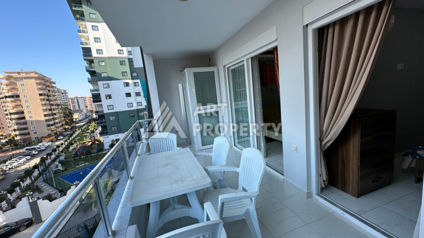 Квартира в Махмутларе 1+1 с мебелью - Ракурс 27