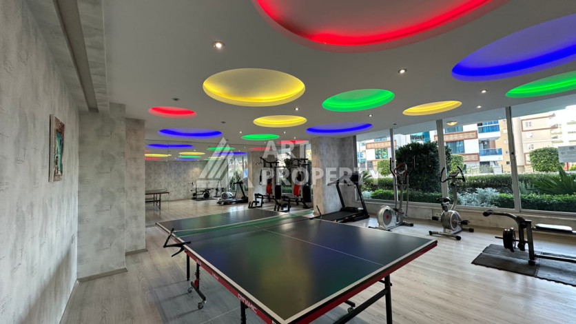 Квартира в Махмутларе 1+1 с мебелью - Ракурс 34