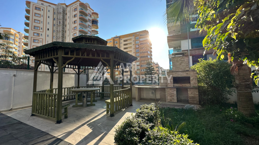 Квартира в Махмутларе 1+1 с мебелью - Ракурс 38