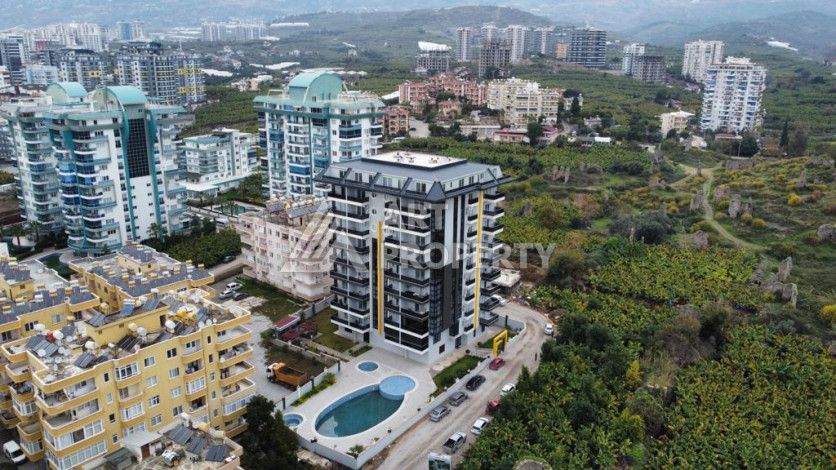 Квартира 1+1 в жилом комплексе с полной инфраструктурой в районе Махмутлар - Ракурс 3