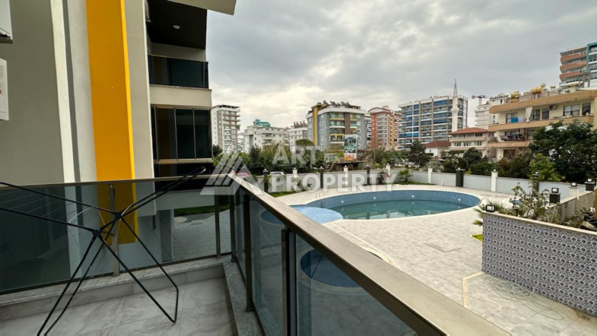 Квартира 1+1 в жилом комплексе с полной инфраструктурой в районе Махмутлар - Ракурс 15