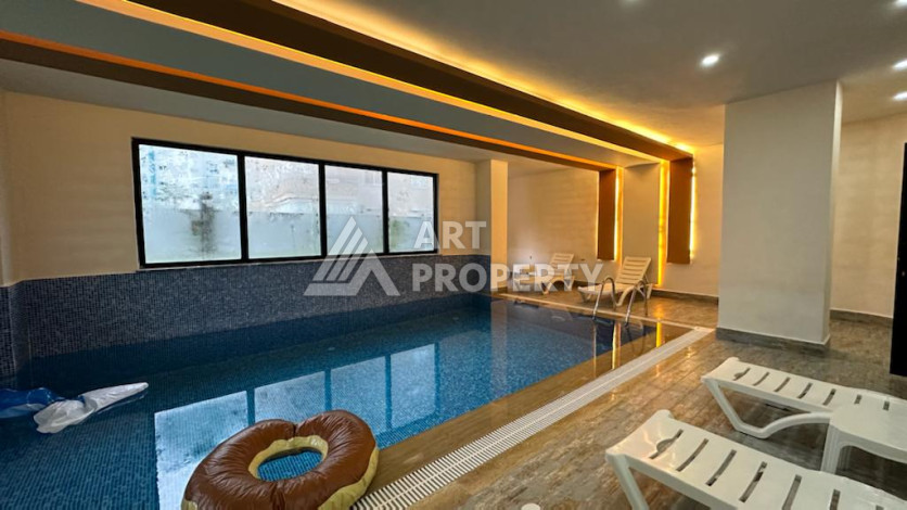 Квартира 1+1 в жилом комплексе с полной инфраструктурой в районе Махмутлар - Ракурс 21