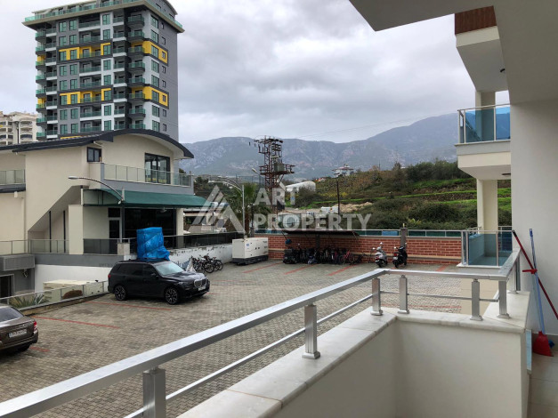 Меблированная квартира с видом на море планировки 2+1 в районе Махмутлар, 110м2 - Ракурс 19