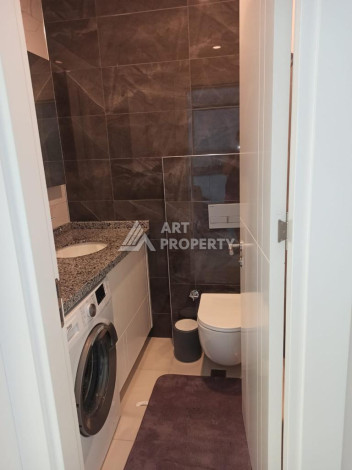 Апартаменты планировки 1+1 в районе Махмутлар, 52м2 - Ракурс 5