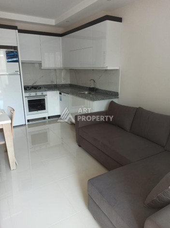 Апартаменты планировки 1+1 в районе Махмутлар, 52м2 - Ракурс 7