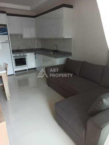 Апартаменты планировки 1+1 в районе Махмутлар, 52м2 - Ракурс 8