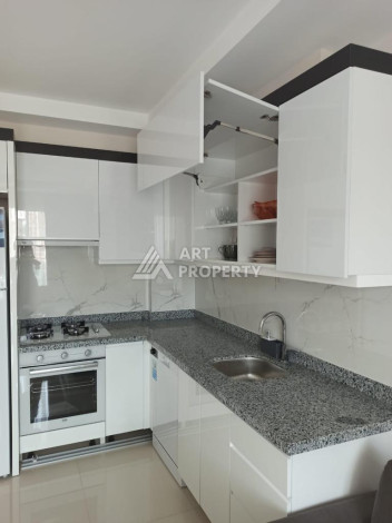 Апартаменты планировки 1+1 в районе Махмутлар, 52м2 - Ракурс 14