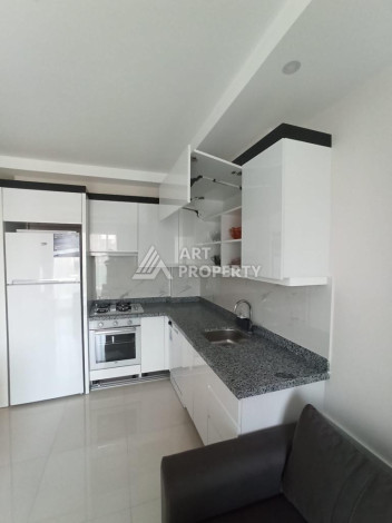 Апартаменты планировки 1+1 в районе Махмутлар, 52м2 - Ракурс 15