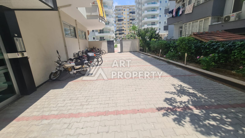 Просторная 125м2 квартира 2+1 в благоустроенном районе махмутлара Махмутларе - Ракурс 10