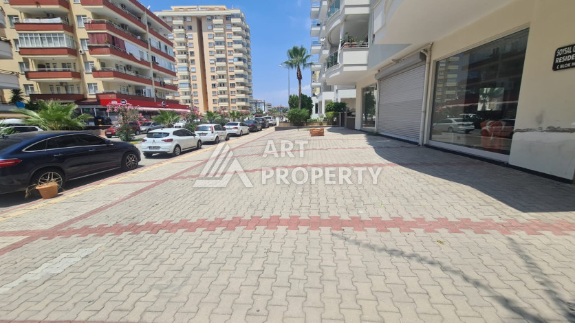 Просторная 125м2 квартира 2+1 в благоустроенном районе махмутлара Махмутларе - Ракурс 11