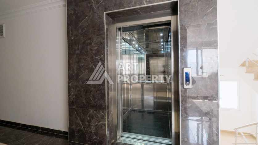 Просторная 125м2 квартира 2+1 в благоустроенном районе махмутлара Махмутларе - Ракурс 18