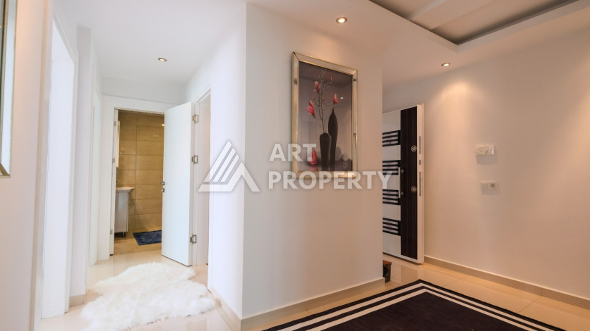 Просторная 125м2 квартира 2+1 в благоустроенном районе махмутлара Махмутларе - Ракурс 19