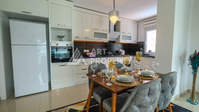 Просторная 125м2 квартира 2+1 в благоустроенном районе махмутлара Махмутларе - Ракурс 26