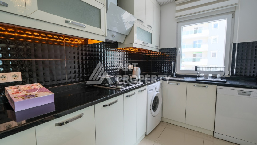 Просторная 125м2 квартира 2+1 в благоустроенном районе махмутлара Махмутларе - Ракурс 27