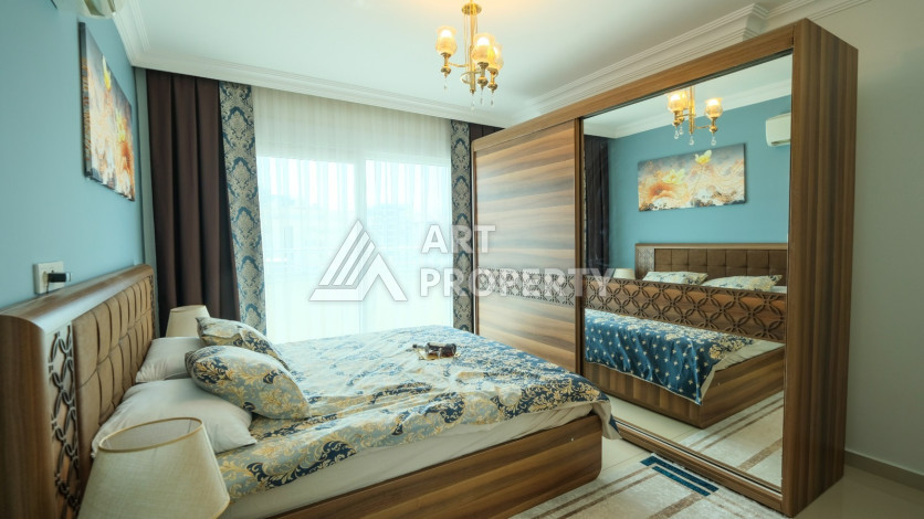 Просторная 125м2 квартира 2+1 в благоустроенном районе махмутлара Махмутларе - Ракурс 34