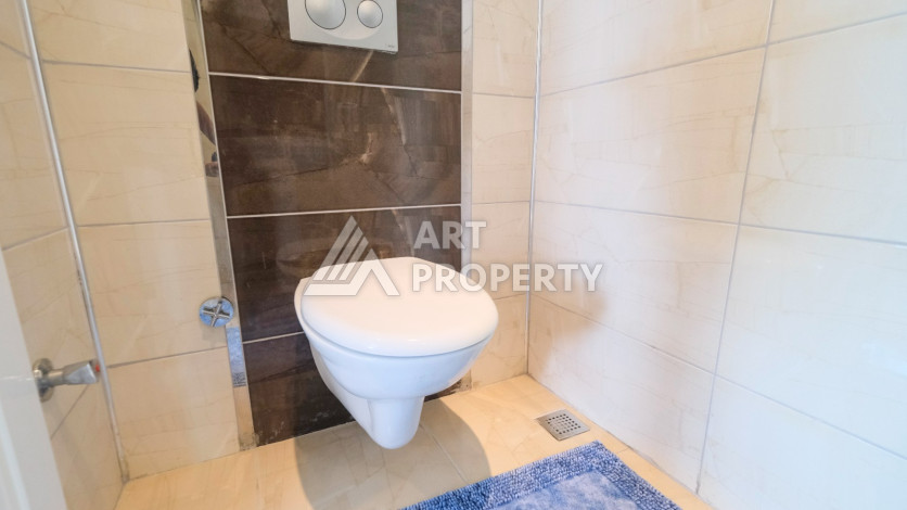 Просторная 125м2 квартира 2+1 в благоустроенном районе махмутлара Махмутларе - Ракурс 39