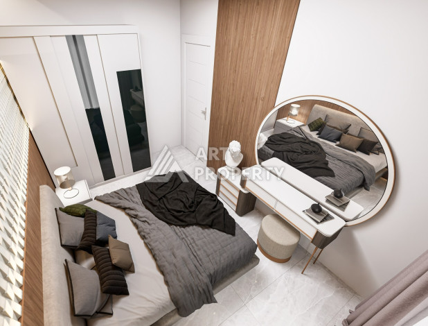 Новый проект в удобной локации, 950метров от моря в районе Махмутлар. - Ракурс 19