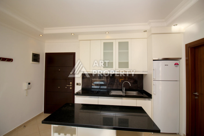 Квартира 1+1 в живописном районе ОБА на первой линии - Ракурс 24