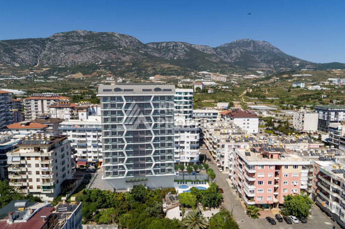 Квартира 1+1 от инвестора в самом центре Махмутлара на завершающем этапе строительства, 55 м2 - Ракурс 2