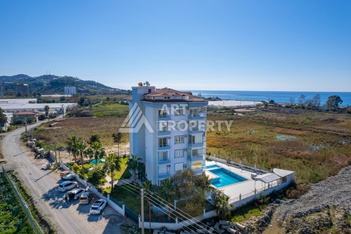 Просторная квартира 1+1 60м2 в шаговой доступности от моря - Ракурс 18