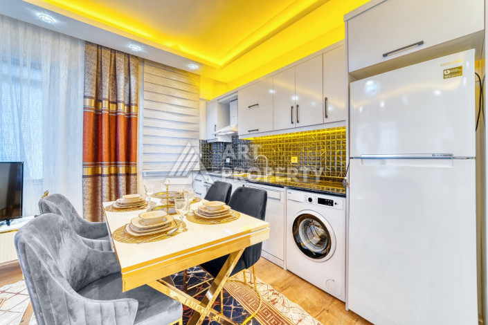 Меблированные апартаменты 1+1 на первой береговой линии в центре Аланьи - Ракурс 4