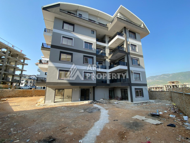 Просторная квартира 60м2 в новом доме 1+1 в районе Оба - Ракурс 2