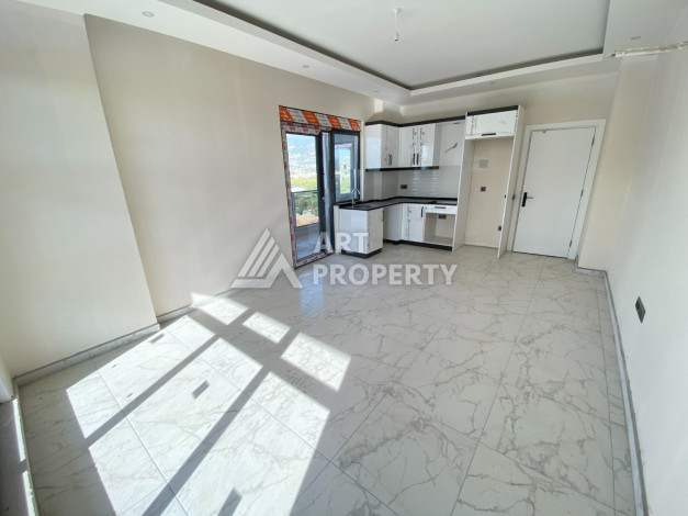 Просторная квартира 60м2 в новом доме 1+1 в районе Оба - Ракурс 3