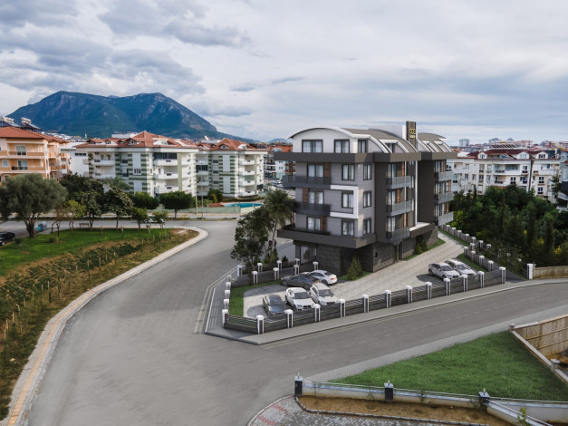 Новый инвестиционный проект на стадии строительства в районе Оба, Алания - Ракурс 2