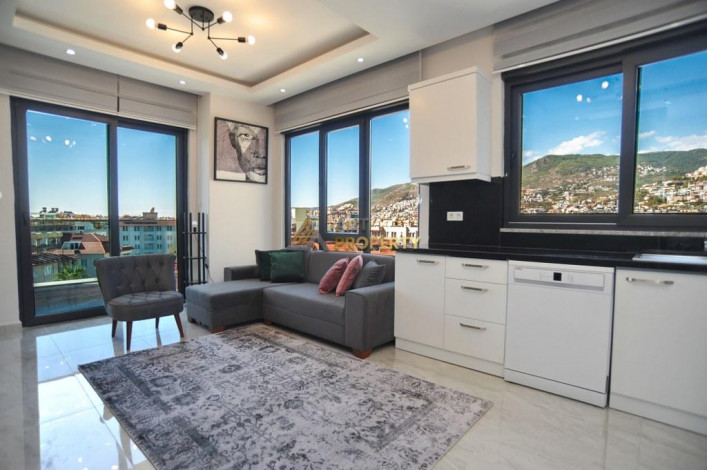 Двухкомнатная квартира в 450 м. от знаменитого пляжа Кейкубат в Алании, 55 м2. - Ракурс 2