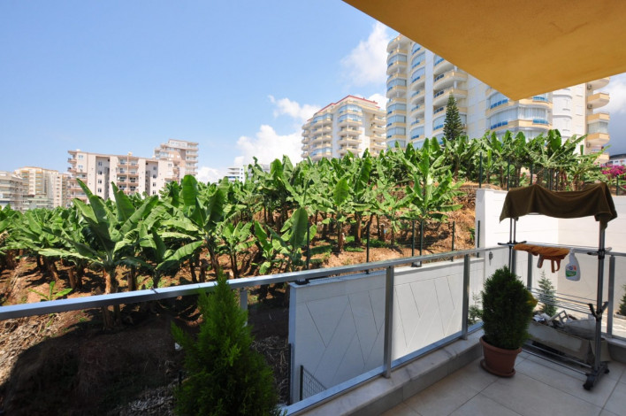 Трехкомнатная квартира c дизайнерским ремонтом в живописном районе Махмутлар, Алания, 115 м2 - Ракурс 3