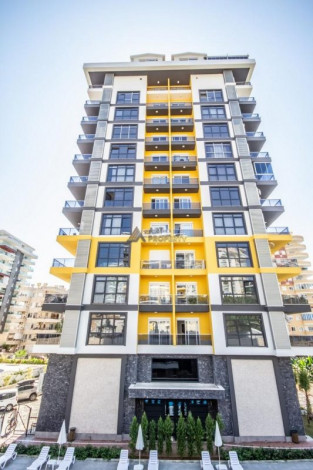 Трехкомнатная квартира c дизайнерским ремонтом в живописном районе Махмутлар, Алания, 115 м2 - Ракурс 4