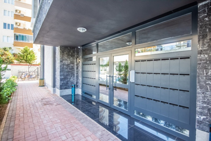 Трехкомнатная квартира c дизайнерским ремонтом в живописном районе Махмутлар, Алания, 115 м2 - Ракурс 9