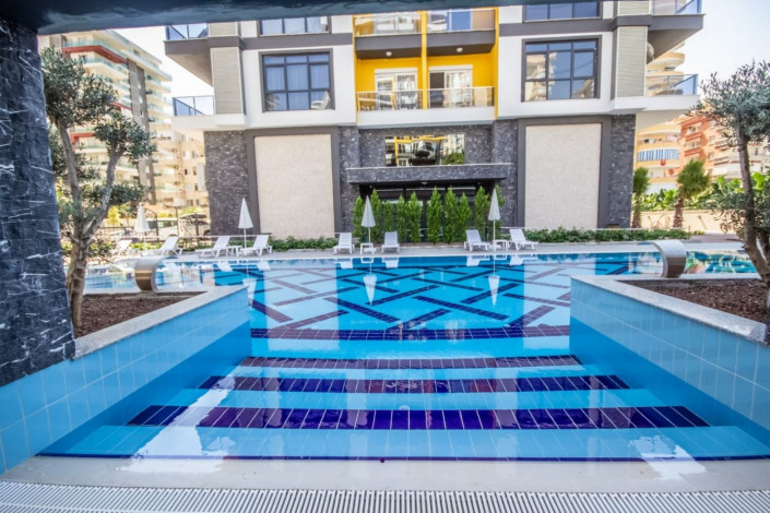 Трехкомнатная квартира c дизайнерским ремонтом в живописном районе Махмутлар, Алания, 115 м2 - Ракурс 11