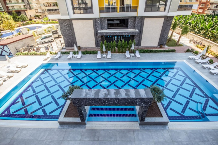 Трехкомнатная квартира c дизайнерским ремонтом в живописном районе Махмутлар, Алания, 115 м2 - Ракурс 13