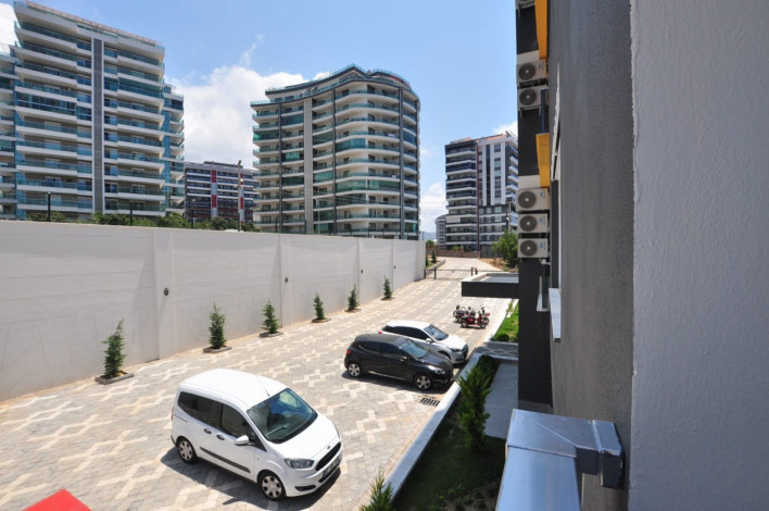 Трехкомнатная квартира c дизайнерским ремонтом в живописном районе Махмутлар, Алания, 115 м2 - Ракурс 25